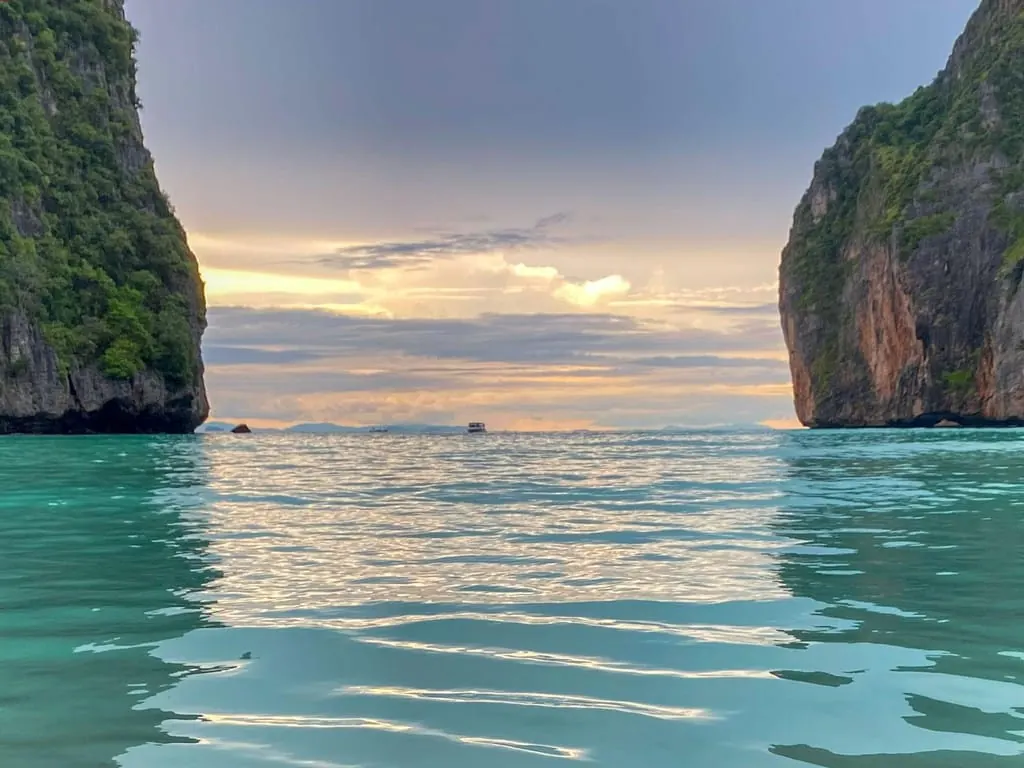 Maya Bay Private Longtail Boat Tour from Koh Phi Phi — longtail boat and island scenery near Ko Phi Phi Leh (photo 3)