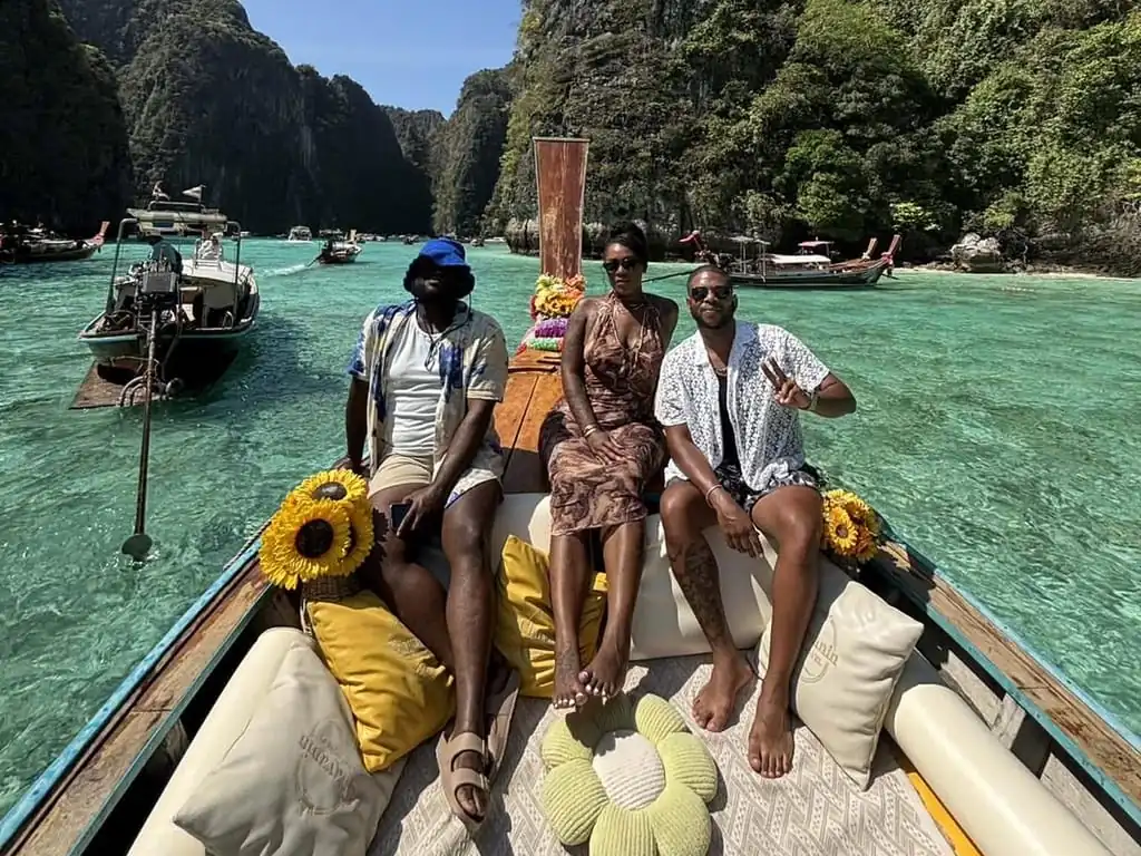 Phuket: Phi Phi Private Longtail Boat with Hotel Transfer — longtail boat and island scenery near Ko Phi Phi Leh (photo 3)