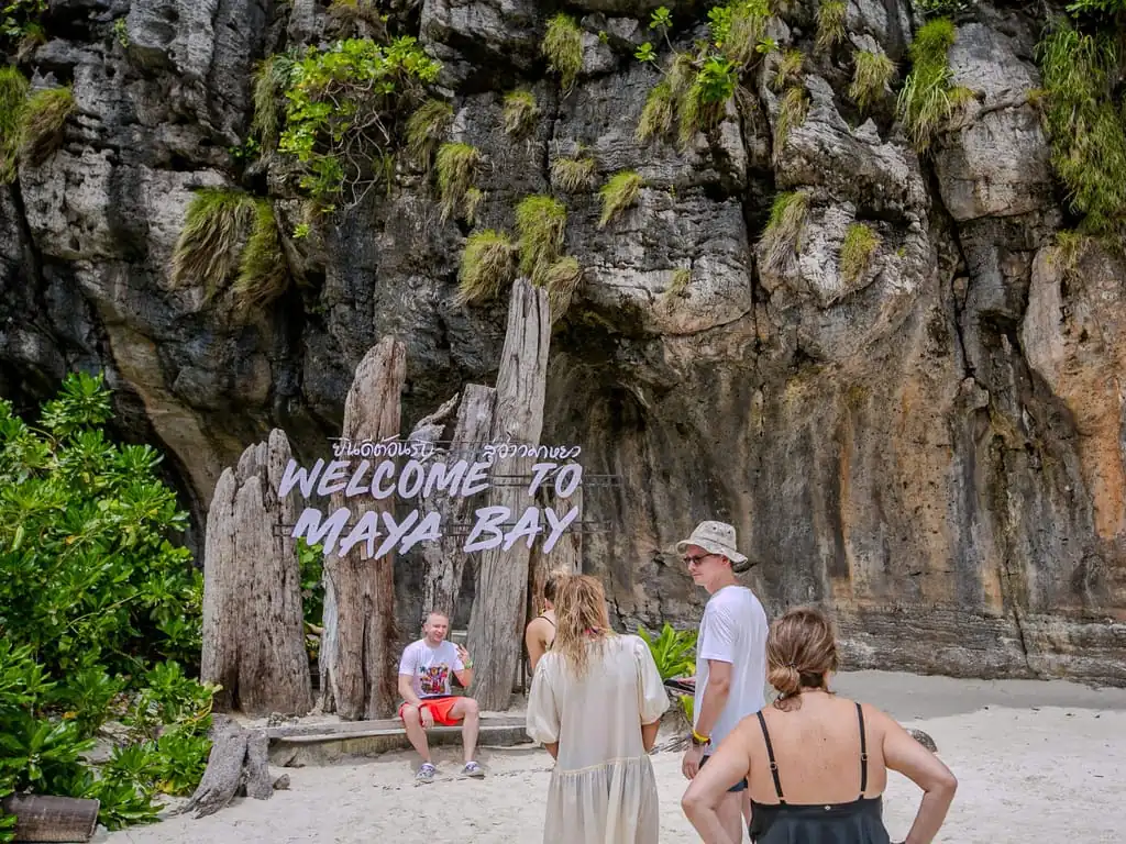 Maya Bay Half-Day Longtail Tour with Snorkelling — longtail boat and island scenery near Ko Phi Phi Leh (photo 3)