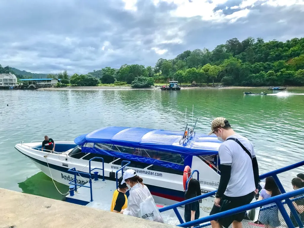 Phuket: One-Way Speedboat Transfer to/from Phi Phi & Lanta — longtail boat and island scenery near Ko Phi Phi Leh (photo 3)